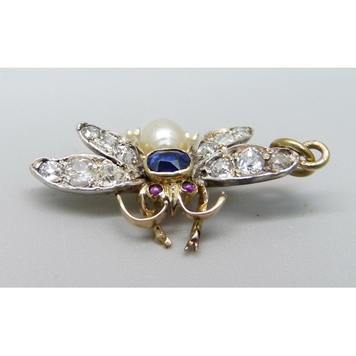 1093 - A diamond, sapphire and pearl set insect pendant with ruby eyes, 2g