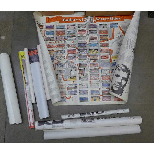 1101 - A collection of posters, including Le Mans and a Bobby Moore cigarette card poster