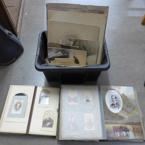 1106 - Three vintage albums of cabinet cards and cartes de visite and other loose photographs