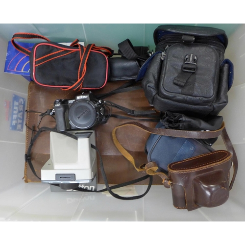 1113 - Assorted cameras, Nikon digital, Polaroid, etc. **PLEASE NOTE THIS LOT IS NOT ELIGIBLE FOR POSTING A... 