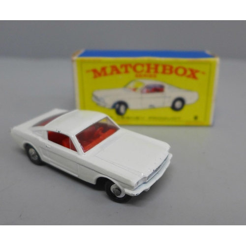 612 - A Matchbox no.8 Ford Mustang with white body and red interior, boxed