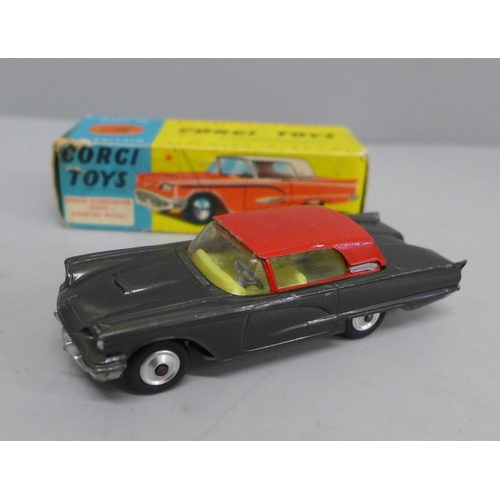 618 - A Corgi Toys no.214S Ford Thunderbird, hard top metallic grey body with red roof and lemon interior,... 