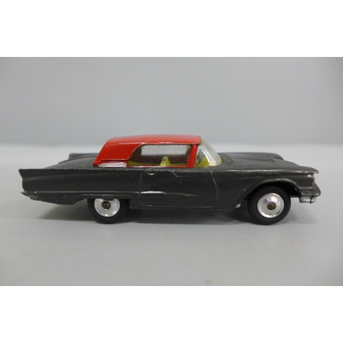 618 - A Corgi Toys no.214S Ford Thunderbird, hard top metallic grey body with red roof and lemon interior,... 