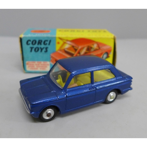 619 - A Corgi Toys no.251 Hillman Imp, blue body with yellow interior, in original box with operating inst... 