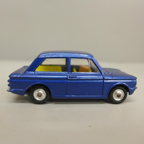 619 - A Corgi Toys no.251 Hillman Imp, blue body with yellow interior, in original box with operating inst... 