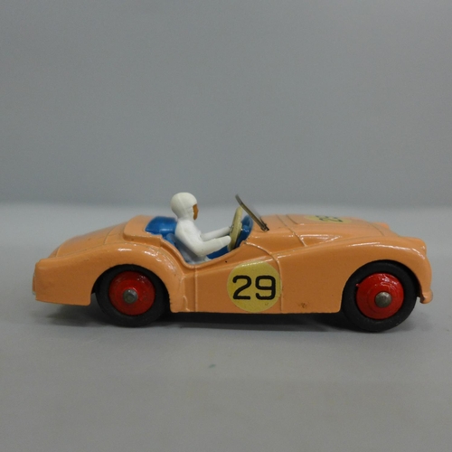 626 - A Dinky Toys 111 TR2 Sports Car in peach with blue interior, boxed