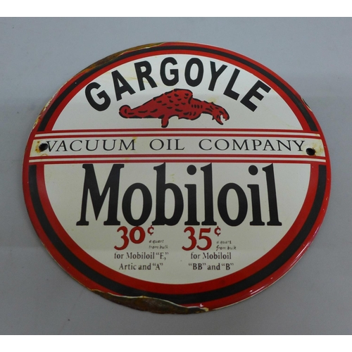 627 - A reproduction Mobil Oil enamelled circular sign, 15.5cm