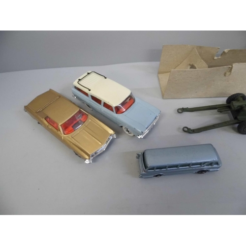 642 - A boxed Dinky Toys no.692 5.5 Medium Gun, Dinky Toys no.193 Rambler Cross Country, Corgi Buick Rivie... 