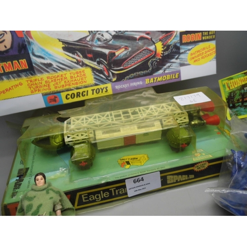 664 - A Dinky Toys Space 1999 Eagle Transporter in original packaging, (plastic a/f) Thunderbirds figures,... 