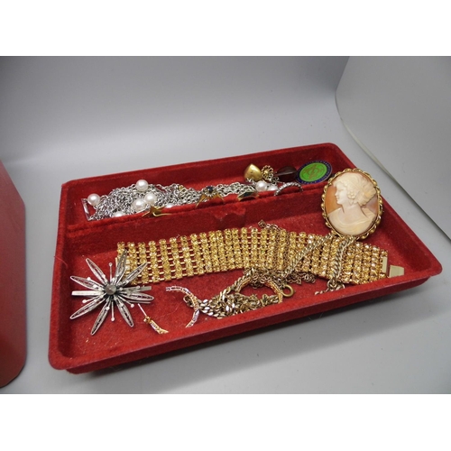 667 - A jewellery box with costume jewellery, a 9ct gold bracelet, a 9ct gold and pearl necklace and two g... 