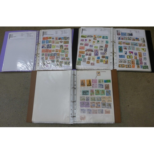 669 - Three albums of stamps