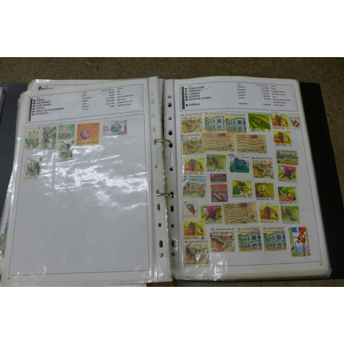 669 - Three albums of stamps