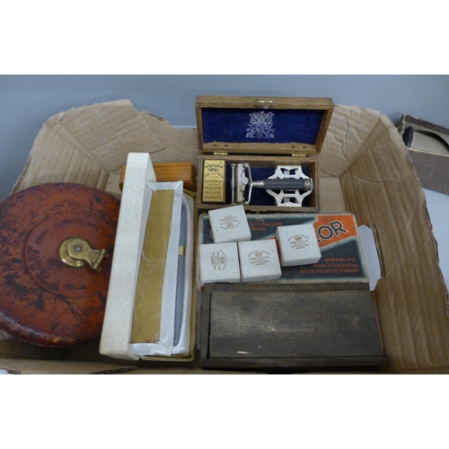 687 - A box of assorted items including micrometer, A.W. Faber slide rule, opera glasses, pen, razors, etc... 