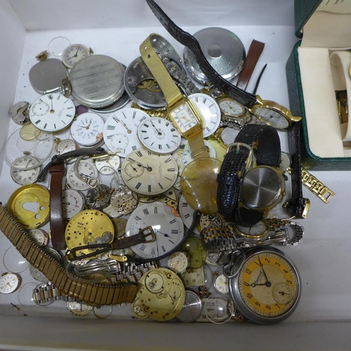 694 - A Seiko perpetual calendar wristwatch, boxed, and a box of watches and watch movements