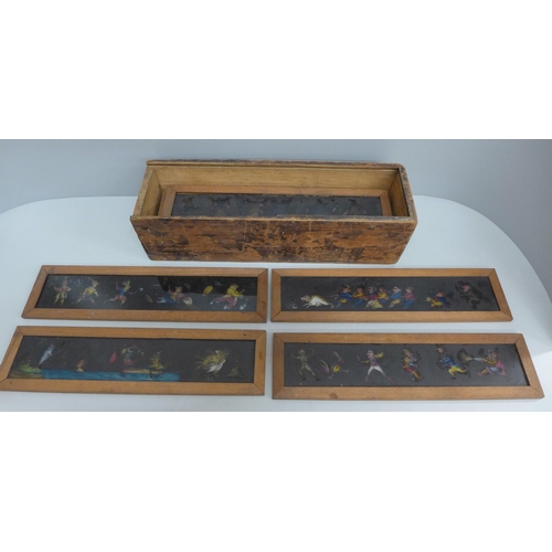 704 - A case of thirteen magic lantern slides