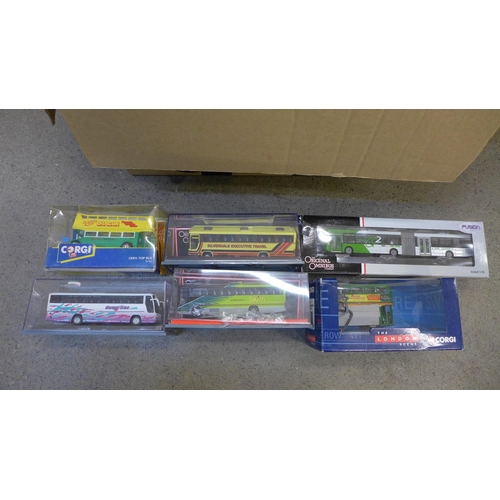 719 - A collection of die-cast buses and coaches including Corgi, Days Gone, boxed