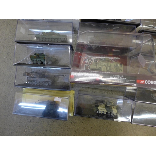 721 - A collection of tanks and other military vehicles, cased