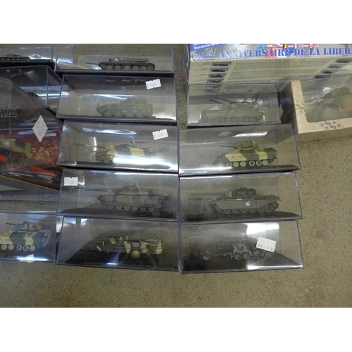 721 - A collection of tanks and other military vehicles, cased