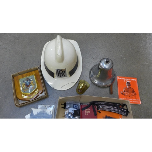 728 - Fire service memorabilia; a Rolls-Royce branded fireman's helmet and a fire bell stamped Winkworth