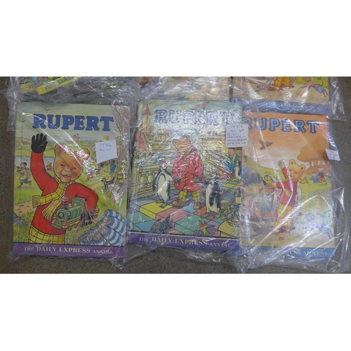 746 - A collection of twelve 1970's Rupert Annuals