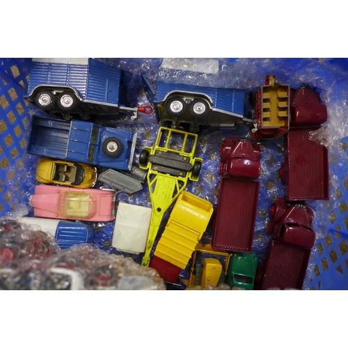 748 - A collection of die-cast model vehicles including Corgi, Dinky and Matchbox, some repainted