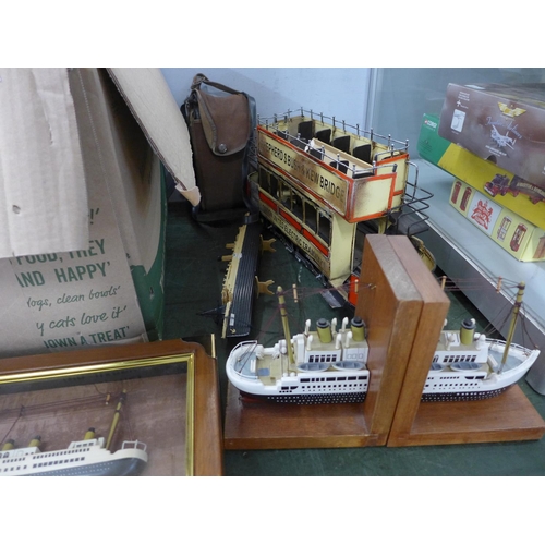 765 - Two model boats, a pair of boat bookends, a metal tram and a Kodak camera, etc.