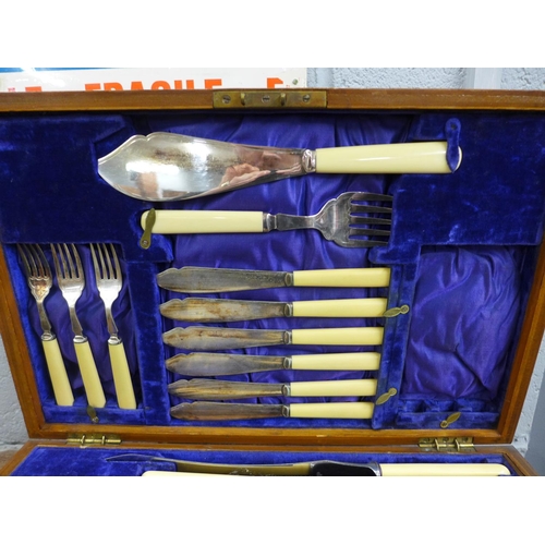 786 - An oak cased canteen of cutlery, incomplete