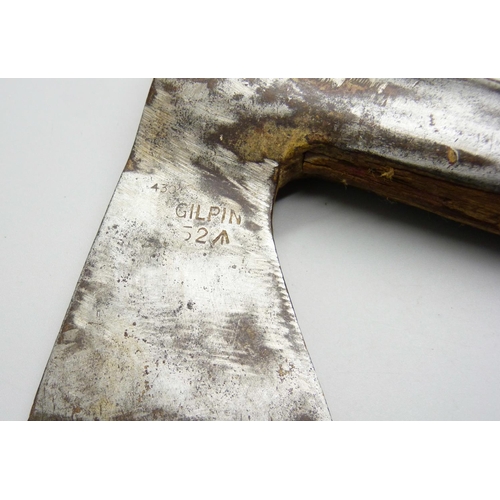 795 - A WWI period fireman's axe, marked Gilpin, and an African fighting stick