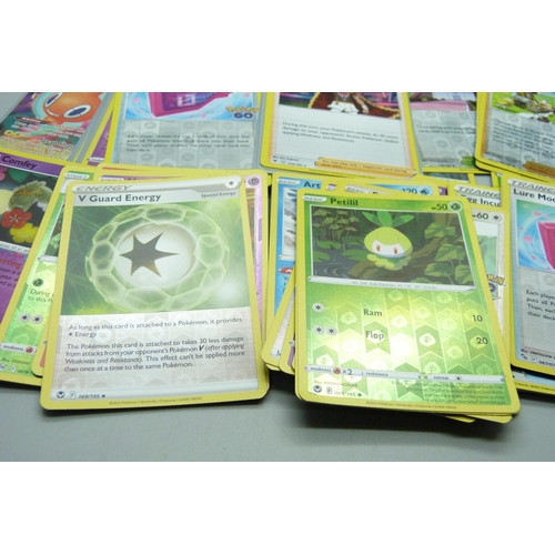 805 - Over 70 assorted Rev and Holo Pokemon cards