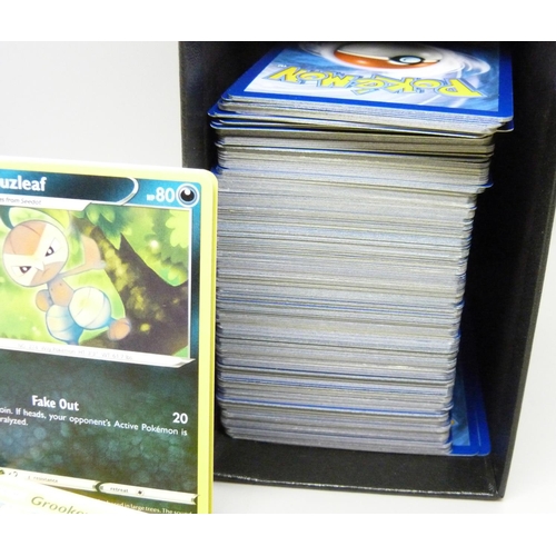 809 - 500 Pokemon cards, various sets in collector's box