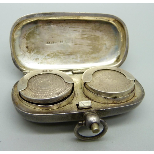 830 - A silver double sovereign holder, a/f one hinge broken and dented, 32g