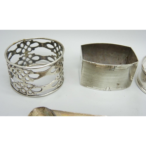 832 - A collection of silver including napkin rings, 148g