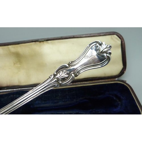 853 - A Victorian silver christening spoon, cased, London 1851, 39g