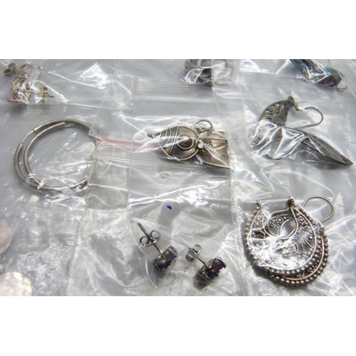 859 - Twenty five pairs of silver earrings