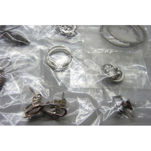 859 - Twenty five pairs of silver earrings