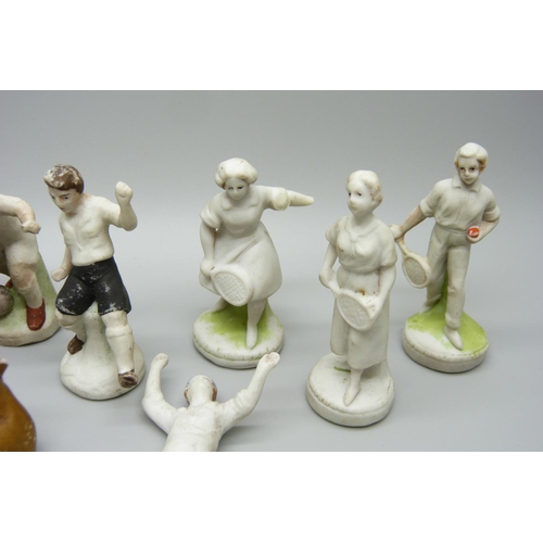 867 - A collection of early 20th Century cake decorations, including cricketers figures, footballers, a te... 