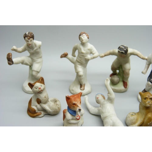 867 - A collection of early 20th Century cake decorations, including cricketers figures, footballers, a te... 