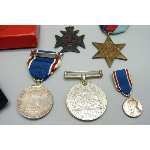 873 - Assorted boxed medals including Coronation 1937, miniature WWII Defence medal, 1939-1945 medals to M... 