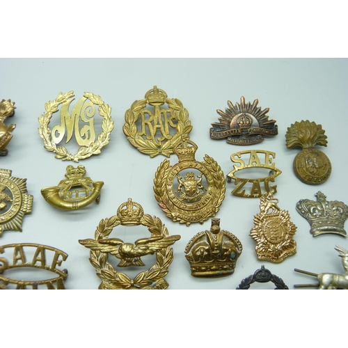 874 - Assorted cap and other badges including Death Or Glory, Boer War Natal Mounted Rifles, a silver RLI ... 