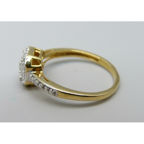 912 - A silver gilt ring set with four diamond accents, L