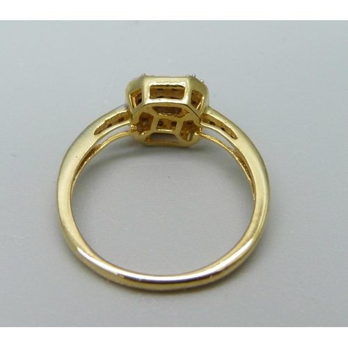 912 - A silver gilt ring set with four diamond accents, L