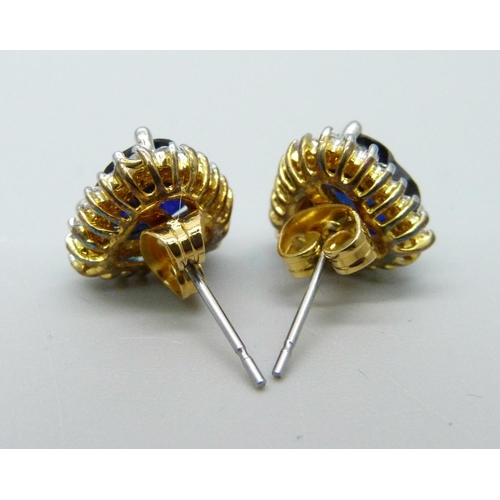 954 - A pair of blue and white stone ear studs