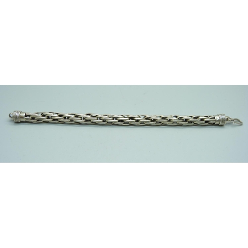 960 - A heavy silver bracelet, 58g