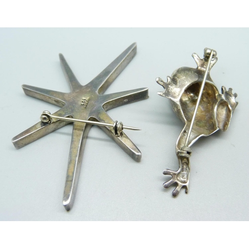 964 - A Mexican silver frog brooch and a Mexican star brooch