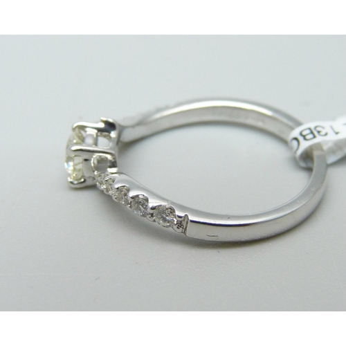 972 - An 18ct white gold and diamond ring, 2.4g, L