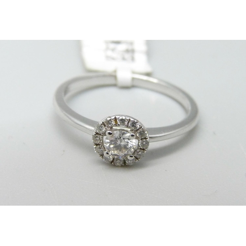 973 - An 18ct white gold and diamond ring, 1.9g, L