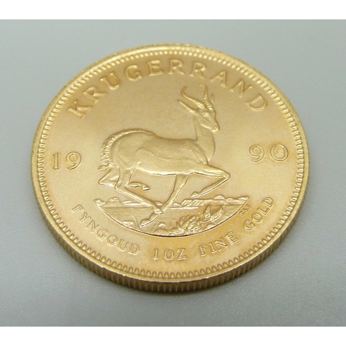 974 - A 1990 gold Krugerrand