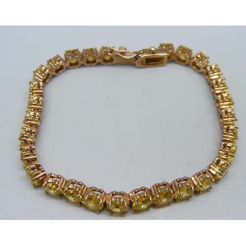 984 - A silver gilt and yellow stone bracelet