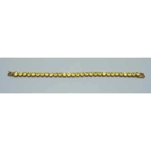 984 - A silver gilt and yellow stone bracelet