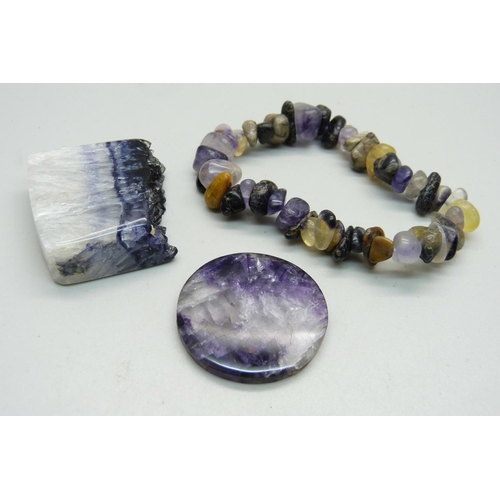 991 - A Blue John cabochon, a polished sample and a polished Blue John stone bracelet